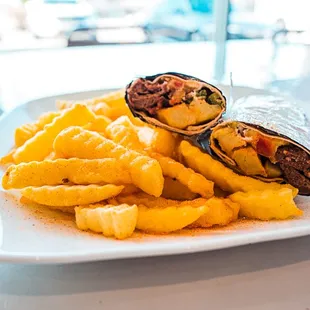 a plate of fries and a burrito