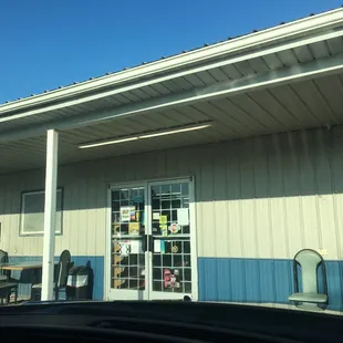the outside of a building with a large window