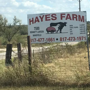 a sign for a farm