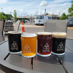  row of beer glasses on a table