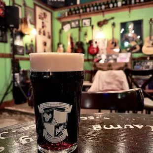  pint of beer on a table