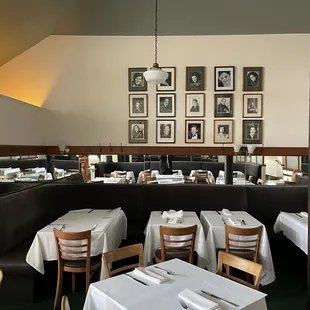 a dining room with tables and chairs
