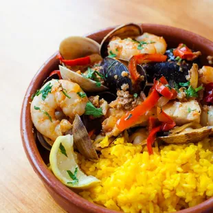 a bowl of seafood and rice