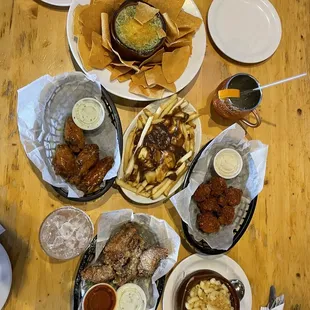 Spinach dip. Poutine. Wings. Mac And Cheese. Sausage Balls. Rosebud.
