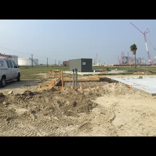 Installing electrical for new communications tower near the ship channel in Ingleside.