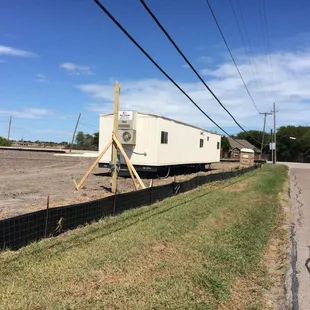 Provide temporary power to this office trailer for the new town home being built at Moore and Marriott in Portland.