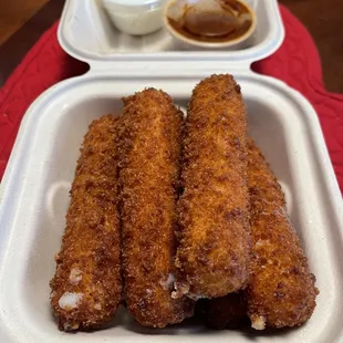 Mozzarella sticks!!! YUM! Comes with ranch and marinara- so good mixed together for dipping!