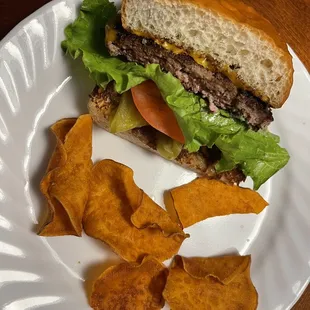 Half of a Down on the Farm burger with homemade sweet potato chips!!