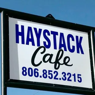 a sign for haystack cafe