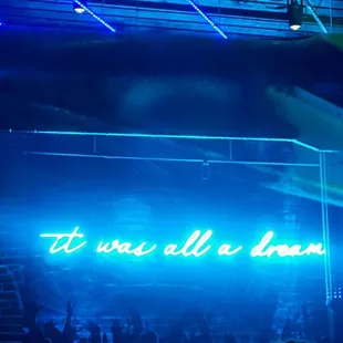 a neon sign that says it was all a dream