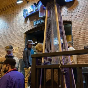 people standing in front of a building
