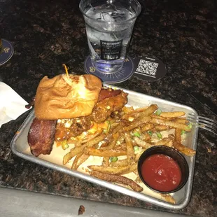 a tray of fries and a sandwich