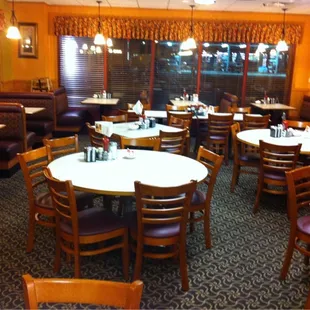 dining area with tables and chairs