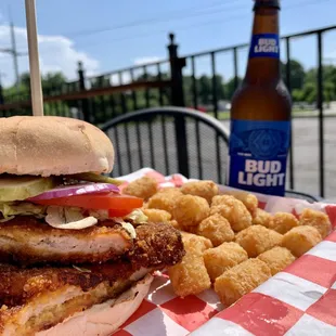 Wednesday Specials Only: Helga Sweet Heat Mustard marinated pork tenderloin sandwich and a side for $12 + $1.50 Bud Lights!