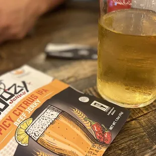 a glass of beer on a table