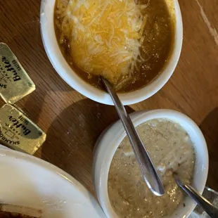 Side of green chili and side of gravy from biscuits and gravy