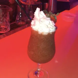 a drink with whipped cream on top