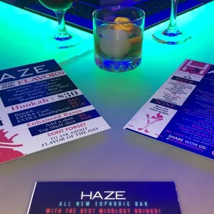 two cocktails and a menu