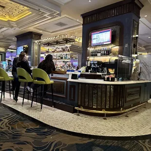 people sitting at the bar