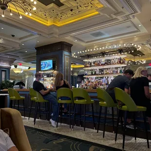 people sitting at the bar