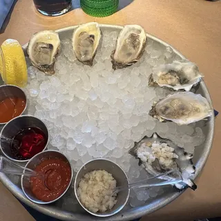 OYSTERS ON THE HALF SHELL