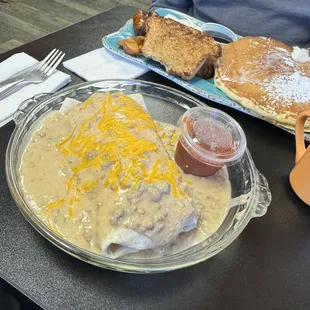 Breakfast burrito with sausage gravy. Sooo good. Had to take half of it home, it was huge!