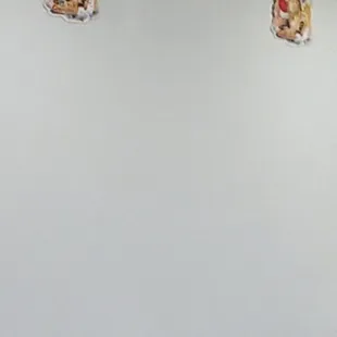 XMAS  decorationS up from Dec. 2023.  Its now Sept 2024.    Nothing looks Huntington Beach in this bagel store named after the city