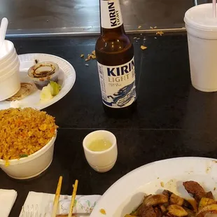 Fried rice. Kirin light. Large hot sake. Steak and scallops.