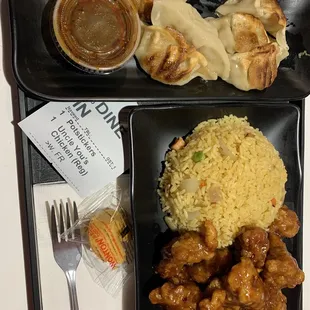 Uncle You&apos;s chicken, with fried rice, plus potstickers.