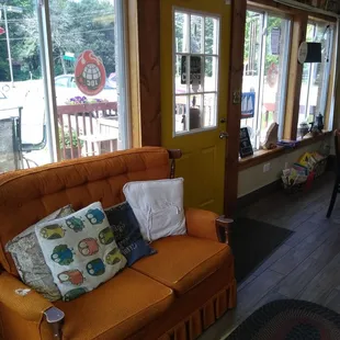 Love seat and front door.