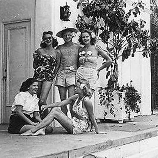George Headley and friends, poolside.