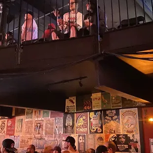 a group of people sitting at a bar