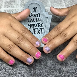 Fun Halloween polish I did on a lil doll.