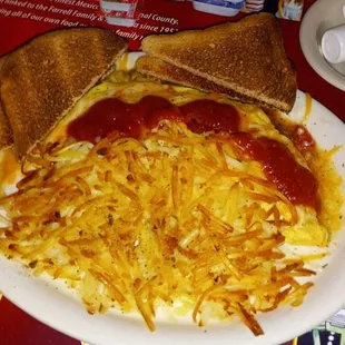 Western omelet with hash browns, wheel toast and salsa.