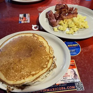 Pancakes breakfast includes two eggs (scrambled), and six pieces of bacon!