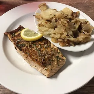 Grilled salmon with German fries.. best salmon in town!