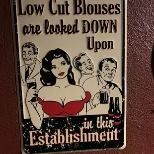 a woman in a red dress and a sign that says low cut houses are forced down upon establishment