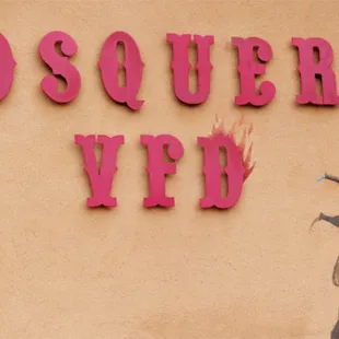 Light-hearted mural on the Mosquero Volunteer Fire Department...