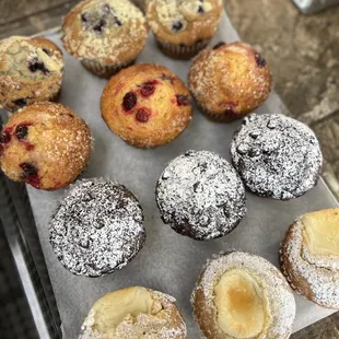 Muffins so moist and yummy! Pumpkin cream cheese (fall seasonal), double chocolate, orange cranberry, and blueberry.