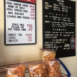 a menu and prices on the wall