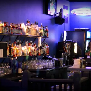 a woman behind the bar