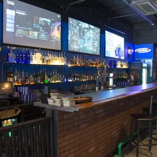 a bar with a large screen