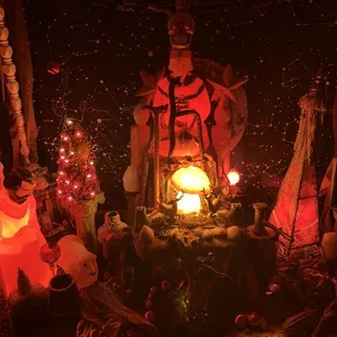 a halloween scene with a lantern and decorations