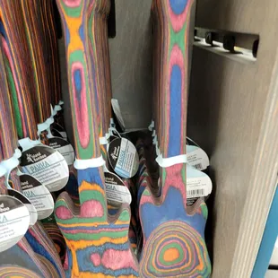 a variety of colorful guitars