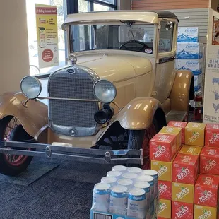 an antique car in a store