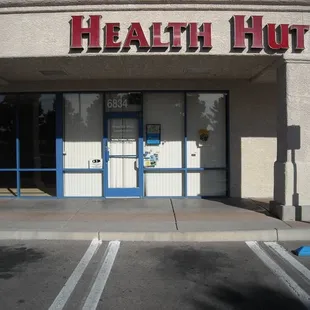 the front entrance of a health hut