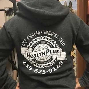 a woman wearing a hoodie