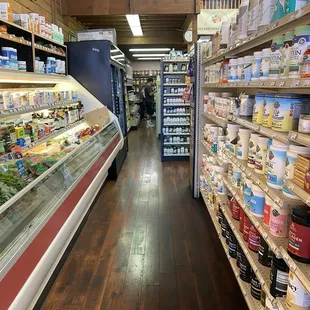 Bulk sales in rear. Veggies at left, vitamins in middle, edibles at right.