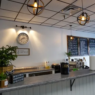 a bar with a clock on the wall