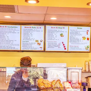 a woman behind the counter